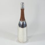 A novelty plated and wooden cocktail shaker, in the form of a bottle of champagne,