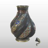 A Chinese cloisonne vase, of wrythen baluster shape, decorated with flowers and scrolls,