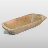 An antique carved sycamore dough trough, of tapered rectangular shape,