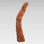 A large Chinese floor standing root wood carving, of curved shape,