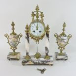 An early 20th century French marble and gilt metal three piece clock garniture,