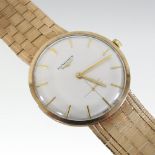 A 1960's Longines 9 carat gold cased gentleman's wristwatch, the signed white dial,