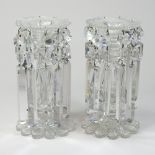 A pair of 19th century clear glass table lustres, suspended with prism shaped drops,