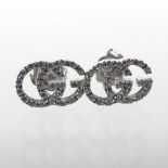 A pair of Gucci 18 carat gold diamond earrings,