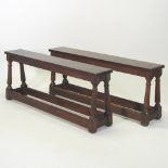 A pair of early 20th century oak benches, each with a chip carved top,
