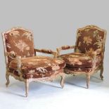 A pair of large French style floral upholstered show frame armchairs,