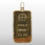 A Bank of Switzerland Union twenty gram gold ingot, numbered 14853,