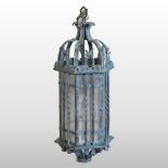 A large Italian style painted bronze lantern, with glazed panels,