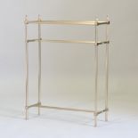 A solid brass stick stand, with reeded columns and turned finials,