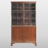 An early 20th century mahogany cabinet bookcase,