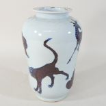 A 19th century Chinese porcelain blue and white vase, decorated in manganese with animals,
