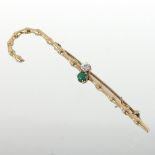 A Victorian 15 carat gold novelty brooch, in the form of a walking cane, set with jade and diamond,