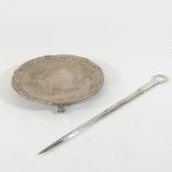 An early 20th century silver waiter, of circular shape, with a piecrust edge,