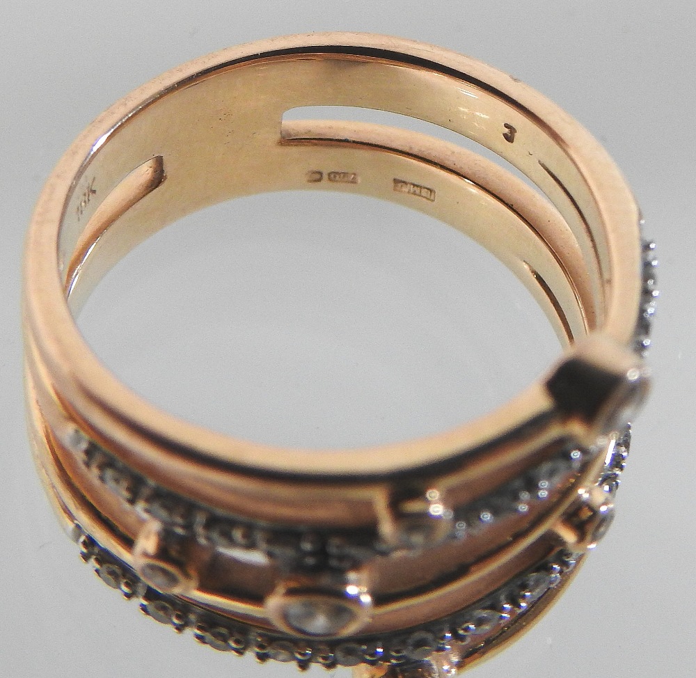 A modern rose gold and white gold diamond ring, of asymmetrical design, - Image 2 of 5