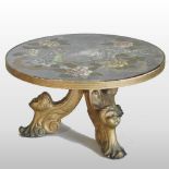 A mirrored coffee table, of circular shape, with painted oriental decoration, on a gilt base,
