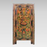An 18th century Tibetan polychrome cabinet, polychrome painted with floral and foliate designs,