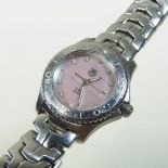 A Tag Heuer Link steel cased ladies bracelet wristwatch, the signed pink pearlescent dial,