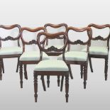 A set of six Victorian carved rosewood kidney back dining chairs,
