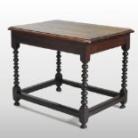 A Charles II style oak side table, on bobbin turned legs,