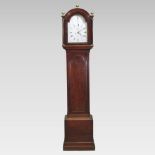 A George III mahogany cased longcase clock, the silvered arched dial with Roman hours, signed,