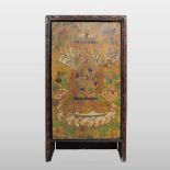 A 19th century Tibetan cabinet, polychrome painted with a vase and foliate designs,
