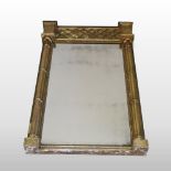 An 18th century carved pine and gilt gesso framed pier mirror, having a rectangular plate,