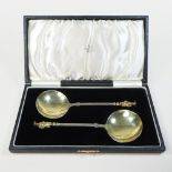 A pair of Victorian silver apostle serving spoons, London 1890, 21cm long,