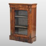 A Victorian walnut pier cabinet, with inlaid decoration and gilt metal mounts,