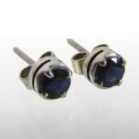 A pair of 18 carat white gold and sapphire stud earrings,