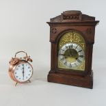 An early 20th century walnut bracket clock, 38cm high,
