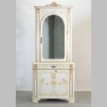 An Italian cream painted and gilt decorated standing corner cabinet, on bracket feet,