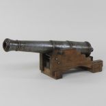 A reproduction cast iron signal cannon,