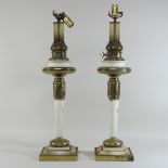 A pair of brass mounted column table lamps,