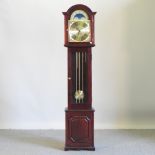 A reproduction longcase clock,