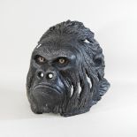 A life size wall mask, in the form of a gorilla,