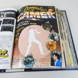 A collection of vintage computer magazines,