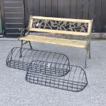 A yellow painted slatted garden bench with cast iron ends, 126cm,