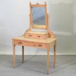 An antique pine dressing table,