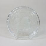 A Lalique style glass ash tray, decorated with a masted ship,