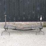 A large cast iron fire grate, 107cm,