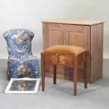 A Victorian pine cabinet, together with a nursing chair with a blue loose cover,