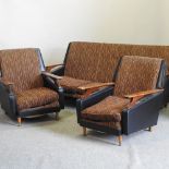 A 1970's teak and upholstered three piece suite,