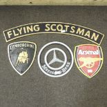 A set of four various painted metal signs to include, Arsenal, Mercedes Benz, Lamborghini,