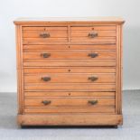 An Edwardian satin walnut chest of drawers,