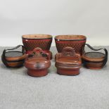 A pair of rice carriers, together with another pair and a pair of Chinese woven baskets,