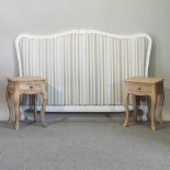 A striped upholstered double headboard, 176cm, together with a pair of wooden side tables,