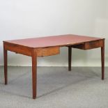 An early 20th century oak military desk, with a red inset surface,