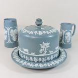 A Jasperware half stilton cheese dish and cover, together with a pair of jugs,