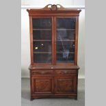 A 19th century walnut cabinet bookcase,