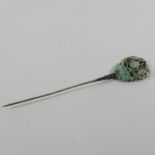 A Chinese carved jade mounted hairpin